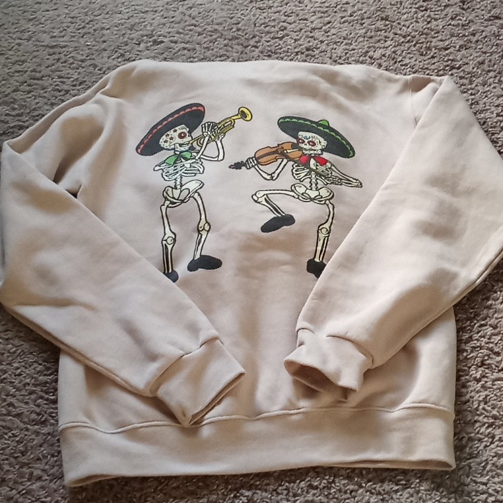 Cream Hoodie with Skeleton Design